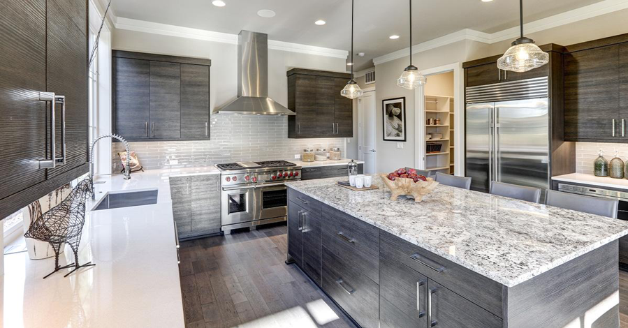 Warm Contemporary Kitchen with Granite and Quartz